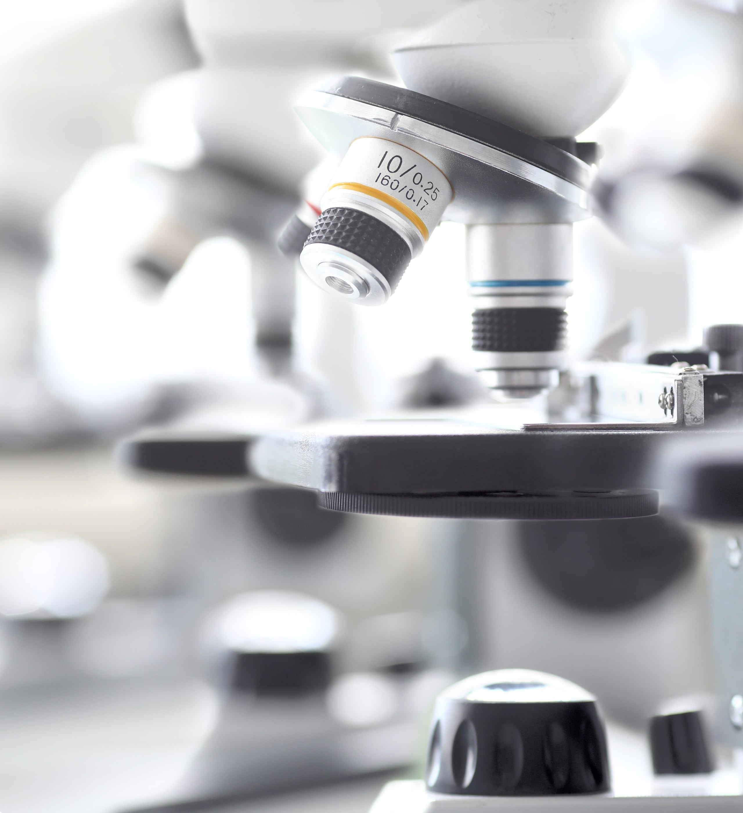 2015 milestone: Amulet Capital founded, close-up of laboratory microscope equipment