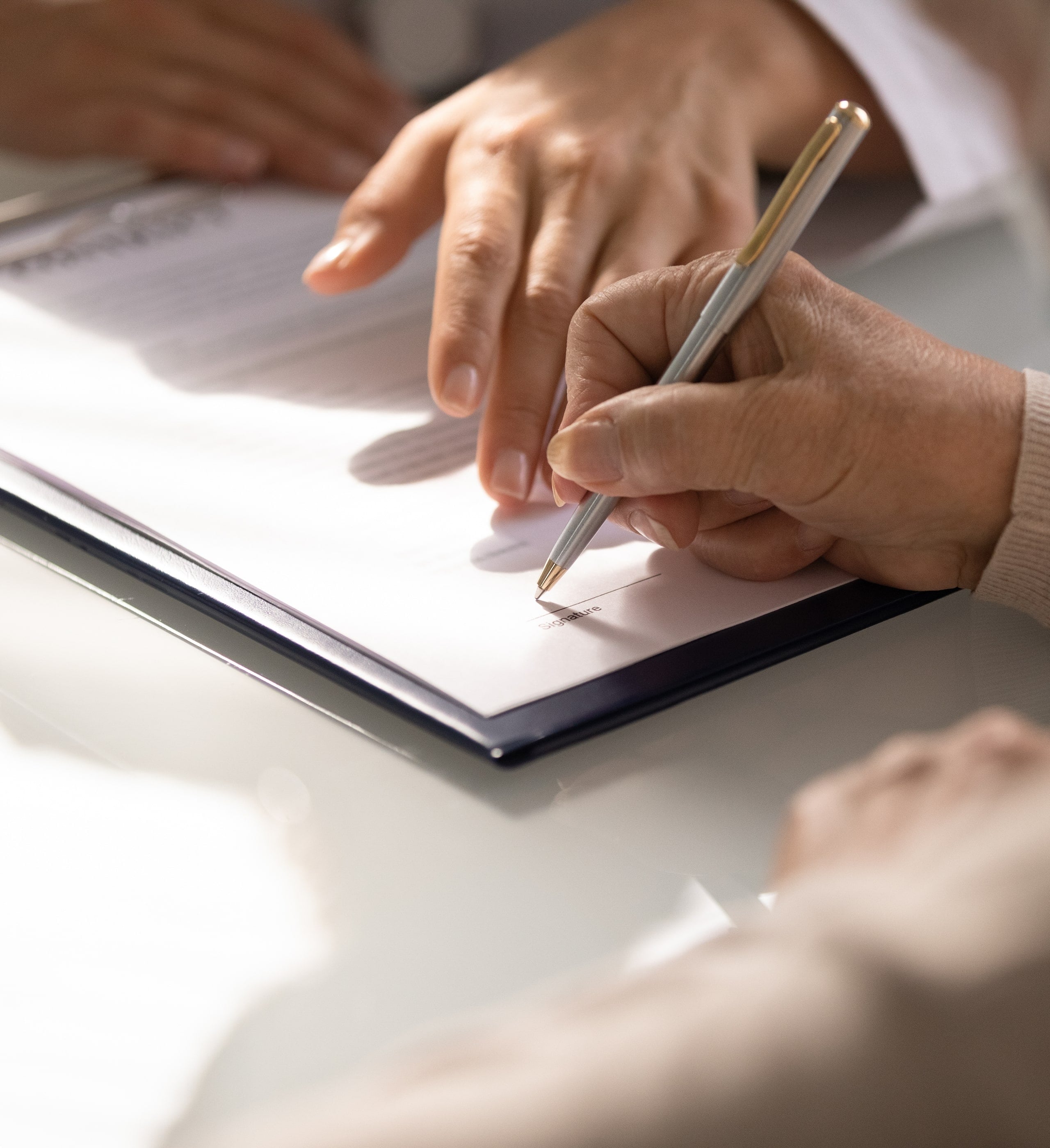 2016 milestone: first major investment activity, person signing business and legal documents