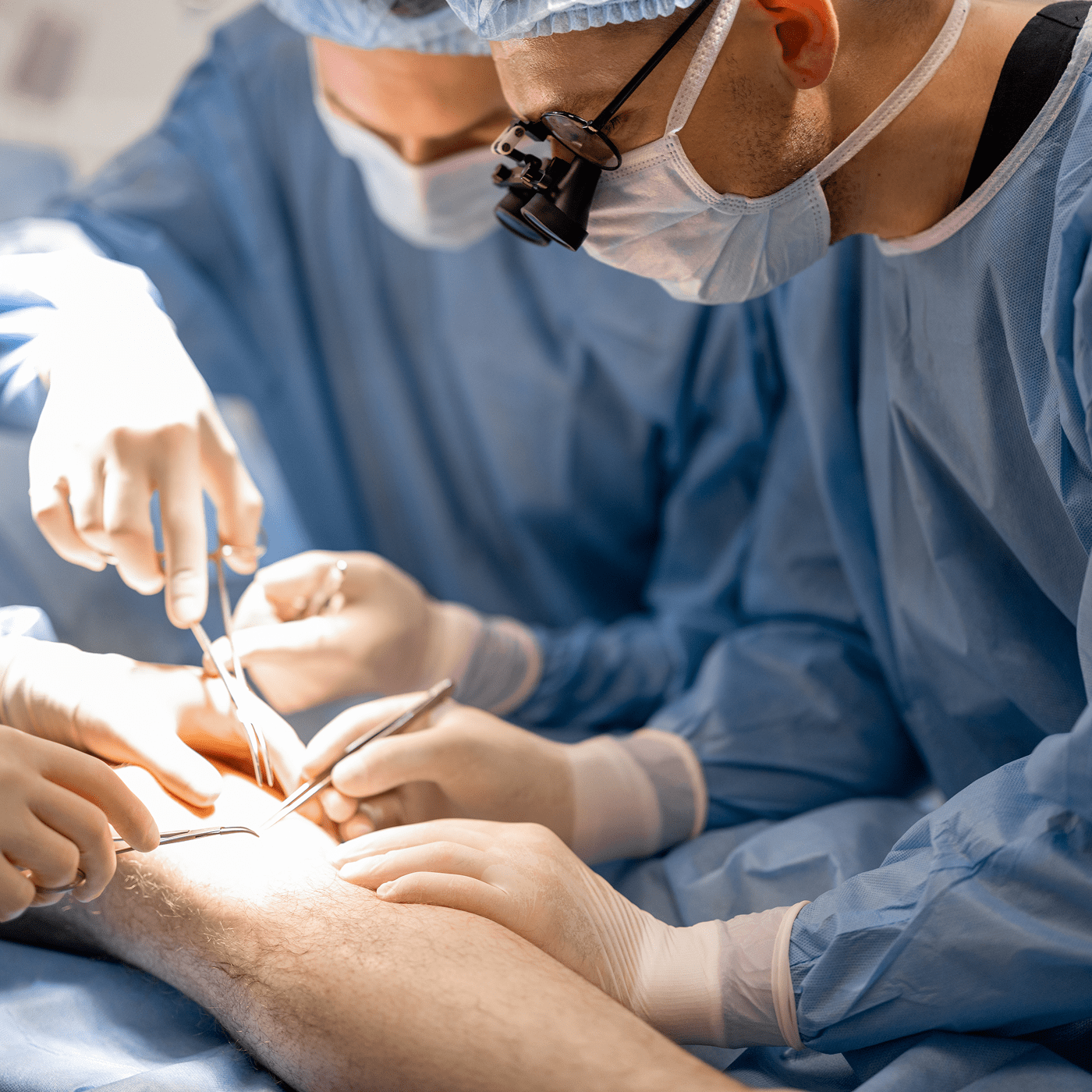 Surgeons performing a medical procedure