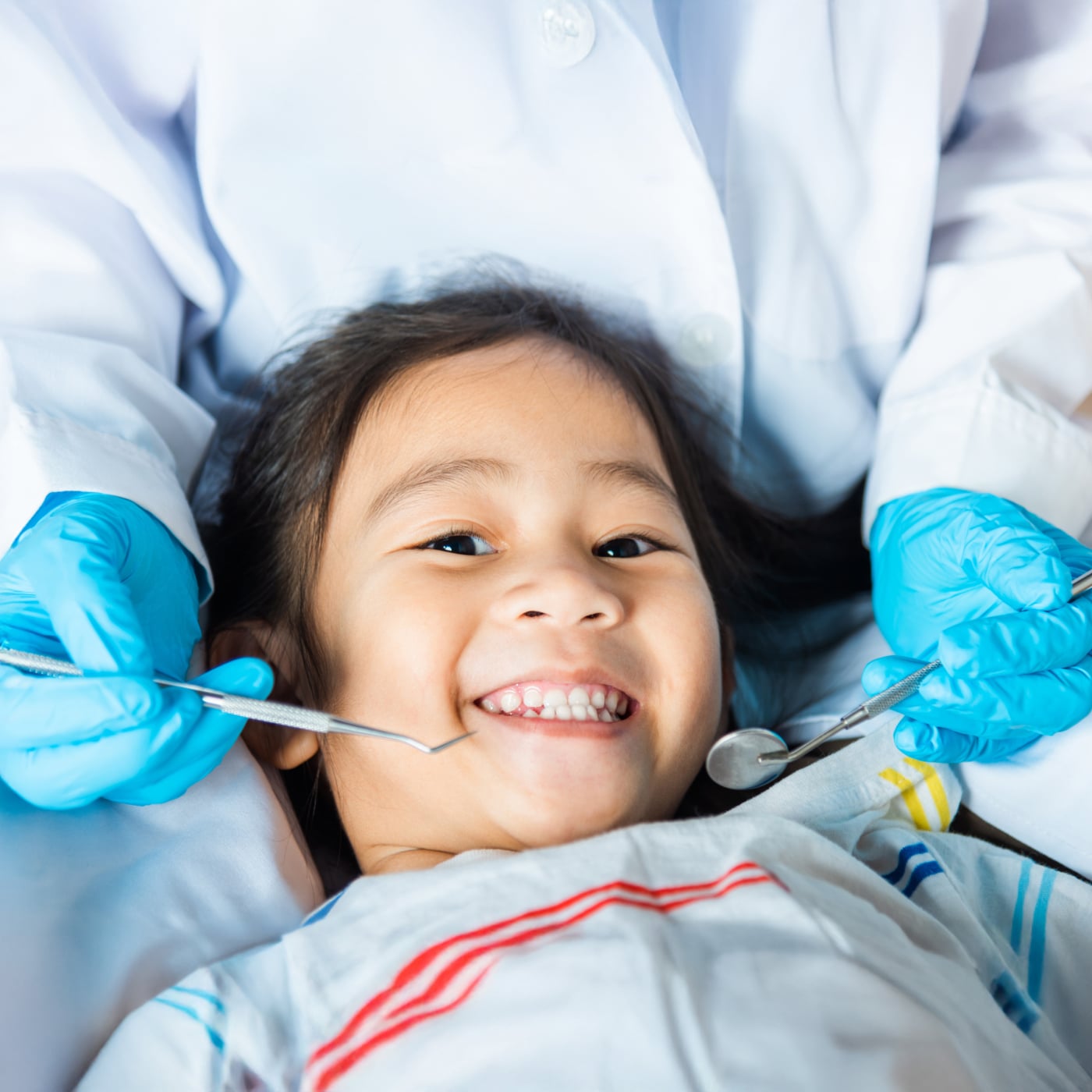 Child receiving dental care at a clinic